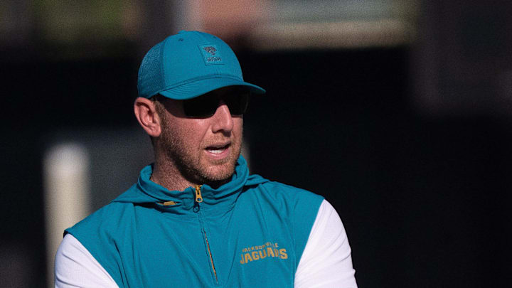 Jacksonville Jaguars Head Coach Liam Coen, left, talks with Assistant Strength and Conditioning Coach Julian Whitehead during the Jacksonville Jaguars’ 18th and final training camp practice at Miller Electric Center in Jacksonville, Fla. Wednesday August 20, 2025. [Doug Engle/Florida Times-Union]
