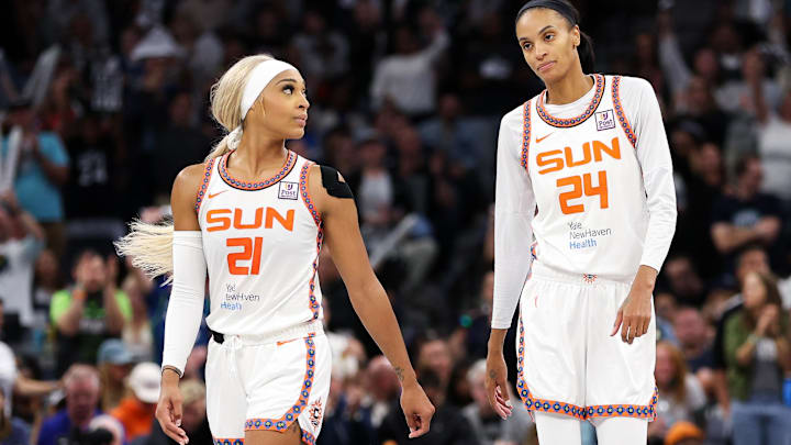 Connecticut Sun guard DiJonai Carrington (21) and forward DeWanna Bonner (24) look on during the second half of game five of the 2024 WNBA playoffs against the Minnesota Lynx. Connecticut Sun guard DiJonai Carrington (21) and forward DeWanna Bonner (24) look on during the second half of game five of the 2024 WNBA playoffs against the Minnesota Lynx.