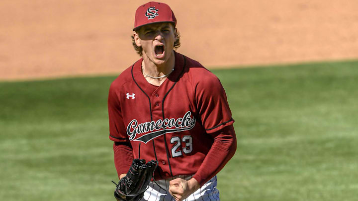 Mar 1, 2025; Greenville, South Carolina, USA; South Carolina Gamecocks pitcher Jake McCoy (23) reacts after striking out a batter against the Clemson Tigers during the top of the fourth inning at Fluor Field. Mandatory Credit: Ken Ruinard/USA Today Network via Imagn Images