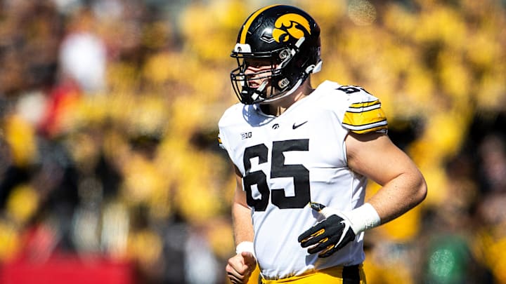 Iowa center Logan Jones (65) runs onto the field during a NCAA football game against Ohio State, Saturday, Oct. 22, 2022, at Ohio Stadium in Columbus, Ohio.

221022 Iowa Ohio St Fb 070 Jpg