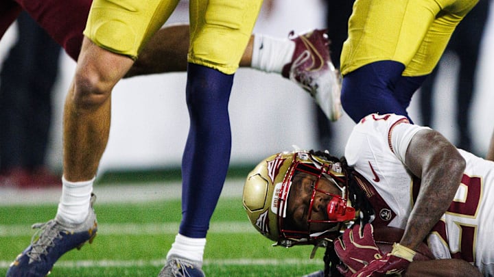 Florida State running back Samuel Singleton Jr. (28) is brought down during a NCAA college football game against Notre Dame at Notre Dame Stadium on Saturday, Nov. 9, 2024, in South Bend. Florida State running back Samuel Singleton Jr. (28) is brought down during a NCAA college football game against Notre Dame at Notre Dame Stadium on Saturday, Nov. 9, 2024, in South Bend.
