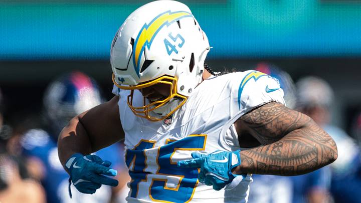 Sep 28, 2025; East Rutherford, New Jersey, USA; Los Angeles Chargers edge rusher Tuli Tuipulotu (45) celebrates after a defensive stop during the first half against the New York Giants at MetLife Stadium. Mandatory Credit: Vincent Carchietta-Imagn Images Sep 28, 2025; East Rutherford, New Jersey, USA; Los Angeles Chargers edge rusher Tuli Tuipulotu (45) celebrates after a defensive stop during the first half against the New York Giants at MetLife Stadium. Mandatory Credit: Vincent Carchietta-Imagn Images
