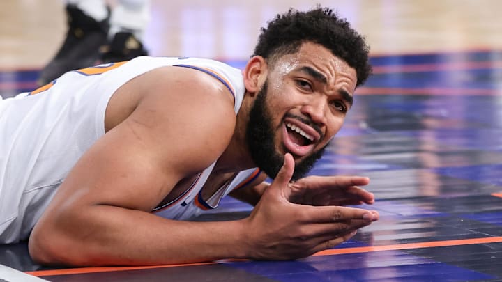 Jan 21, 2026; New York, New York, USA;  New York Knicks center Karl-Anthony Towns (32) reacts after geting called for an offensive foul in the second quarter against the Brooklyn Nets at Madison Square Garden. Mandatory Credit: Wendell Cruz-Imagn Images