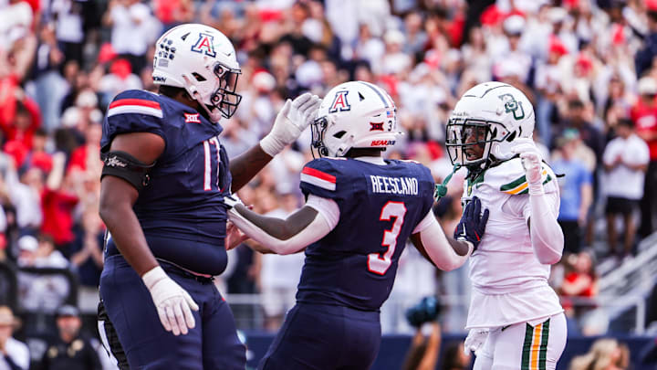 Nov 22, 2025; Tucson, Arizona, USA; Arizona Wildcats running back Kedrick Reescano (3) separates players after he scored a touchdown during the third quarter of the game against the Baylor Bears at Casino Del Sol Stadium. Mandatory Credit: Aryanna Frank-Imagn Images