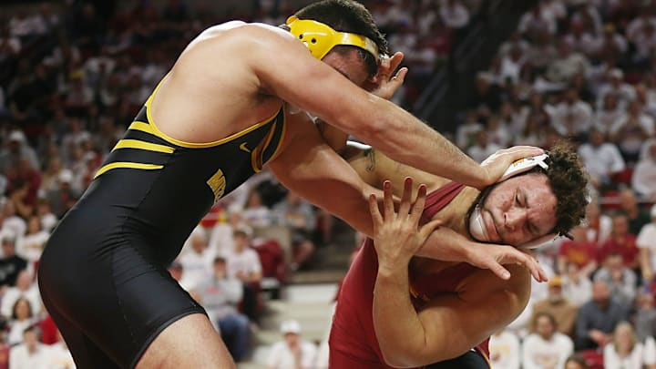 Iowa State Cyclones Yonger Bastida and Missouri Tigers' Zach Elam wrestle during their 285-pound wrestling in the Big-12-conference showdown at Hilton Coliseum on Sunday, Feb. 25, 2024, in Ames, Iowa