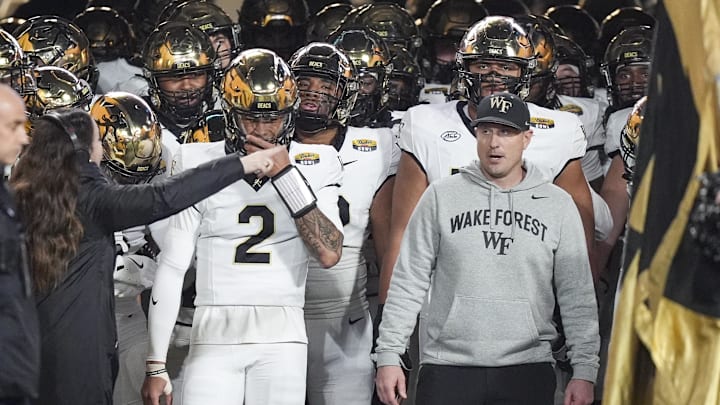 Jan 2, 2026; Charlotte, NC, USA; Wake Forest Demon Deacons head coach Jake Dickert ready to lead his team onto the field during the first quarter against the Mississippi State Bulldogs at Bank of America Stadium. Mandatory Credit: Jim Dedmon-Imagn Images