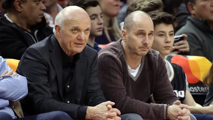 Jan 22, 2017; Toronto, Ontario, CAN; Toronto Maple Leafs general manager Lou Lamoriello and New York Yankees general manager Brian Cashman watch the Toronto Raptors play against the Phoenix Suns at Air Canada Centre. Mandatory Credit: Tom Szczerbowski-Imagn Images