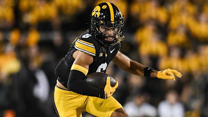 Oct 18, 2025; Iowa City, Iowa, USA; Iowa Hawkeyes wide receiver Seth Anderson (6) runs after the catch against the Penn State Nittany Lions during the first quarter at Kinnick Stadium. Mandatory Credit: Jeffrey Becker-Imagn Images