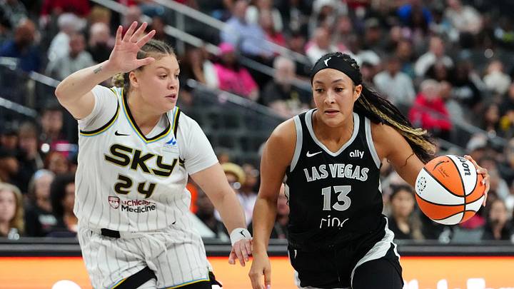 Sep 9, 2025; Las Vegas, Nevada, USA; Las Vegas Aces guard Aaliyah Nye (13) dribbles against Chicago Sky guard Rachel Banham (24) during the fourth quarter at T-Mobile Arena. Mandatory Credit: Stephen R. Sylvanie-Imagn Images