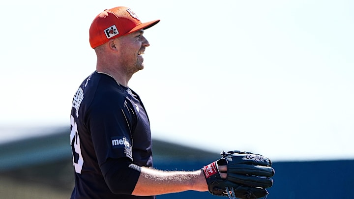 Detroit Tigers pitcher Tarik Skubal smiles after throwing a pitch during spring training at TigerTown in Lakeland, Fla. on Friday, Feb. 21, 2025.