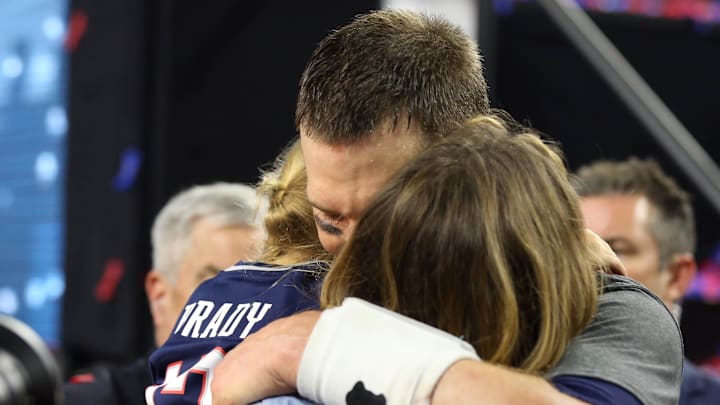 Feb 5, 2017; Houston, TX, USA; New England Patriots quarterback Tom Brady (12) hugs his wife Gisele Bundchen after beating the Atlanta Falcons during Super Bowl LI at NRG Stadium. 