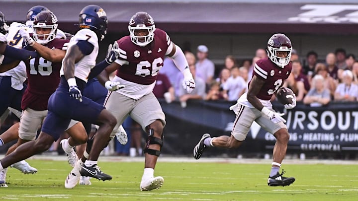 Sep 14, 2024; Starkville, Mississippi, USA; Mississippi State Bulldogs wide receiver Kevin Coleman Jr. (3) runs the ball against the Toledo Rockets during the first quarter at Davis Wade Stadium at Scott Field. Mandatory Credit: Matt Bush-Imagn Images