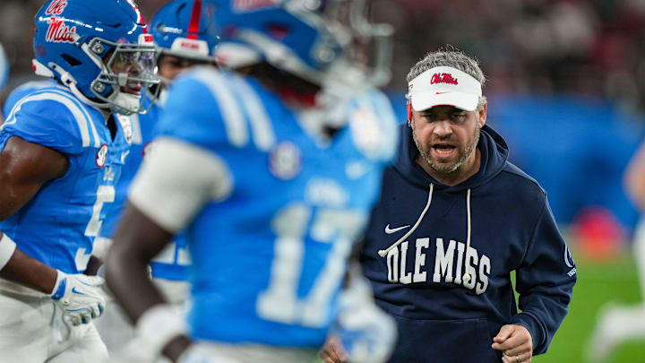 Ole Miss head coach Pete Golding runs off the field during warmups before the CFP Fiesta Bowl at the State Farm Stadium, in Glendale, Ariz., on Thursday, Jan. 8, 2026. Ole Miss head coach Pete Golding runs off the field during warmups before the CFP Fiesta Bowl at the State Farm Stadium, in Glendale, Ariz., on Thursday, Jan. 8, 2026.