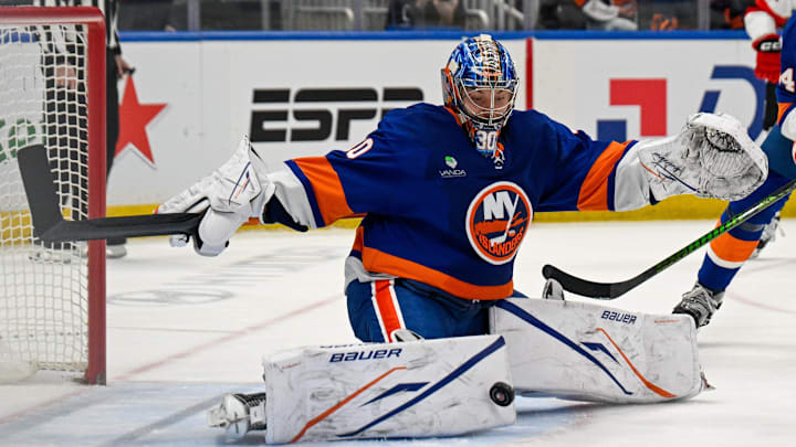 Jan 6, 2026; Elmont, New York, USA;  New York Islanders goaltender Ilya Sorokin (30) makes a save against the New Jersey Devils during the third period at UBS Arena. Mandatory Credit: Dennis Schneidler-Imagn Images