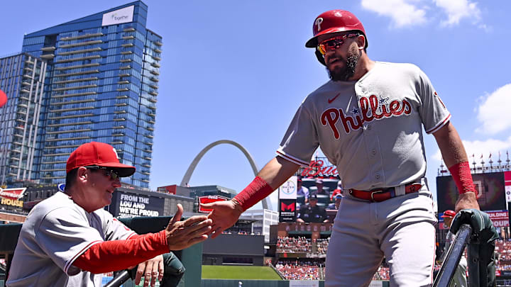 Jul 10, 2022; St. Louis, Missouri, USA;  Philadelphia Phillies left fielder Kyle Schwarber (12) celebrates with interim manager Rob Thomson (59) after scoring against the St. Louis Cardinals during the first inning at Busch Stadium. Mandatory Credit: Jeff Curry-Imagn Images