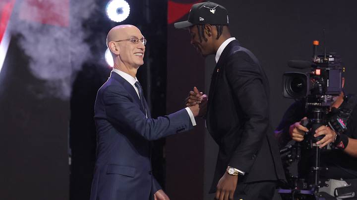 Jun 23, 2026; New York, NY, USA; NBA commissioner Adam Silver greets the fourth pick in the 2026 NBA draft, North Carolina forward Caleb Wilson after he was selected by the Chicago Bulls at Barclays Center. Mandatory Credit: Brad Penner-Imagn Images Jun 23, 2026; New York, NY, USA; NBA commissioner Adam Silver greets the fourth pick in the 2026 NBA draft, North Carolina forward Caleb Wilson after he was selected by the Chicago Bulls at Barclays Center. Mandatory Credit: Brad Penner-Imagn Images