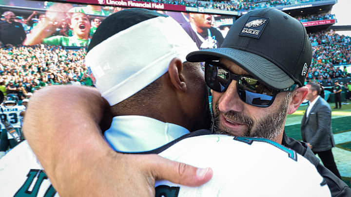 Sep 21, 2025; Philadelphia, Pennsylvania, USA; Philadelphia Eagles quarterback Jalen Hurts (1) and head coach Nick Sirianni hug after a victory against the Los Angeles Rams at Lincoln Financial Field. Mandatory Credit: Bill Streicher-Imagn Images