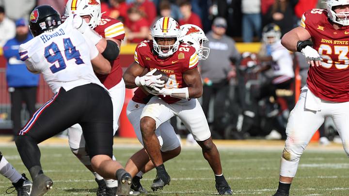 Nov 22, 2025; Ames, Iowa, USA; Iowa State Cyclones running back Abu Sama (24) runs the football against the Kansas Jayhawks during the second half at Jack Trice Stadium. Mandatory Credit: Reese Strickland-Imagn Images