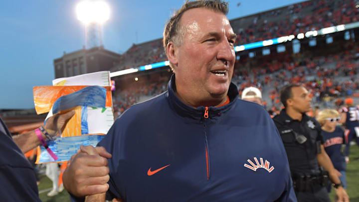 Oct 12, 2024; Champaign, Illinois, USA; Illinois Fighting Illini head coach Bret Bielema celebrates a 50-49 win over the Purdue Boilermakers at Memorial Stadium. Mandatory Credit: Ron Johnson-Imagn Images