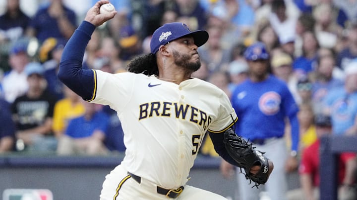Oct 4, 2025; Milwaukee, Wisconsin, USA; Milwaukee Brewers starting pitcher Freddy Peralta (51) pitches against the Chicago Cubs during the second inning of game one of the NLDS round for the 2025 MLB playoffs at American Family Field. Mandatory Credit: Michael McLoone-Imagn Images