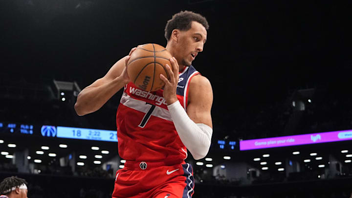 Oct 14, 2024; Brooklyn, New York, USA; Washington Wizards forward Patrick Baldwin Jr. (7) grabs a rebound against the Brooklyn Nets during the first half at Barclays Center.