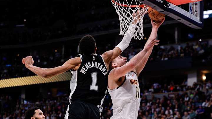 Apr 2, 2024; Denver, Colorado, USA; San Antonio Spurs center Victor Wembanyama (1) blocks the shot Apr 2, 2024; Denver, Colorado, USA; San Antonio Spurs center Victor Wembanyama (1) blocks the shot