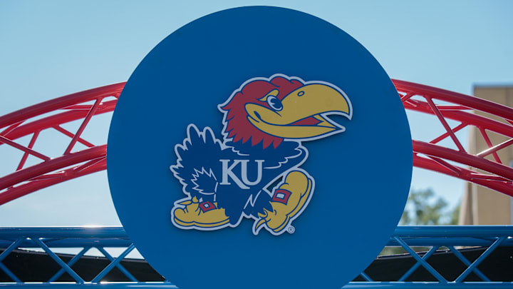 Oct 1, 2022; Lawrence, Kansas, USA; Kansas Jayhawks logo at entrance to the field prior to the game between the Kansas Jayhawks and the Iowa State Cyclones at David Booth Kansas Memorial Stadium. Mandatory Credit: William Purnell-Imagn Images