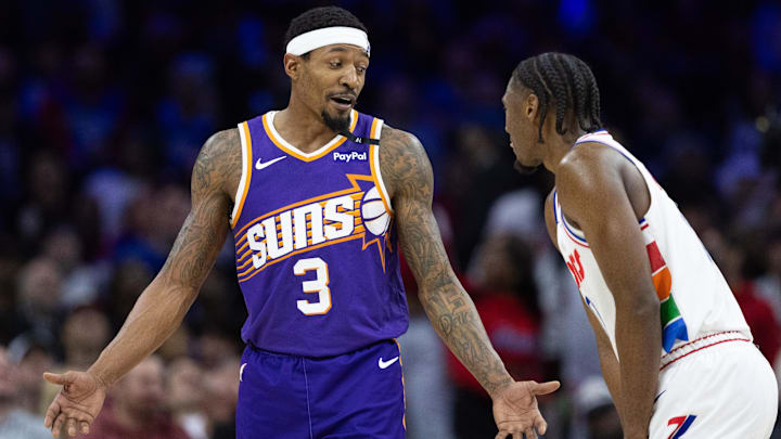 Jan 6, 2025; Philadelphia, Pennsylvania, USA; Phoenix Suns guard Bradley Beal (3) and Philadelphia 76ers guard Tyrese Maxey (0) talk during a break in action during the fourth quarter at Wells Fargo Center. Mandatory Credit: Bill Streicher-Imagn Images