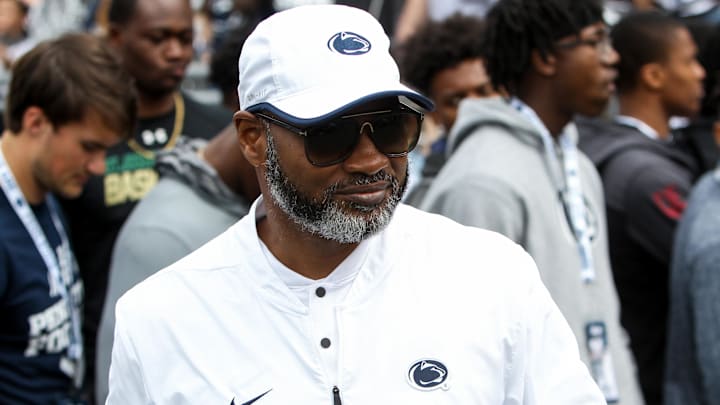 Penn State Nittany Lions assistant head coach Terry Smith walks onto the field prior to the Blue-White spring game at Beaver Stadium.
