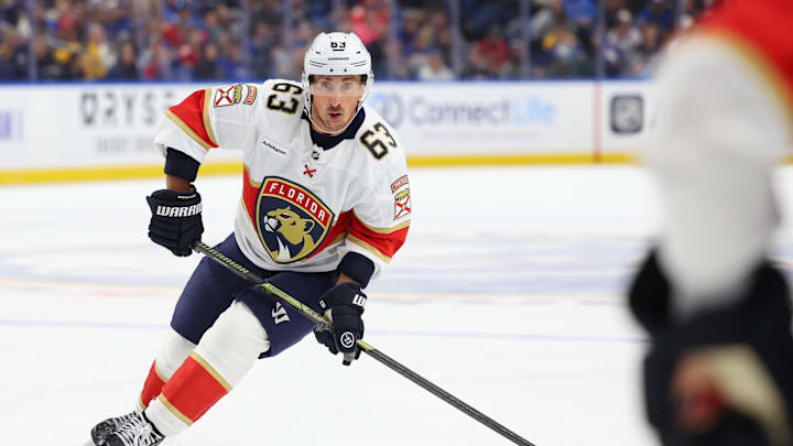 Oct 18, 2025; Buffalo, New York, USA;  Florida Panthers left wing Brad Marchand (63) looks to pass during the first period against the Buffalo Sabres at KeyBank Center. Mandatory Credit: Timothy T. Ludwig-Imagn Images