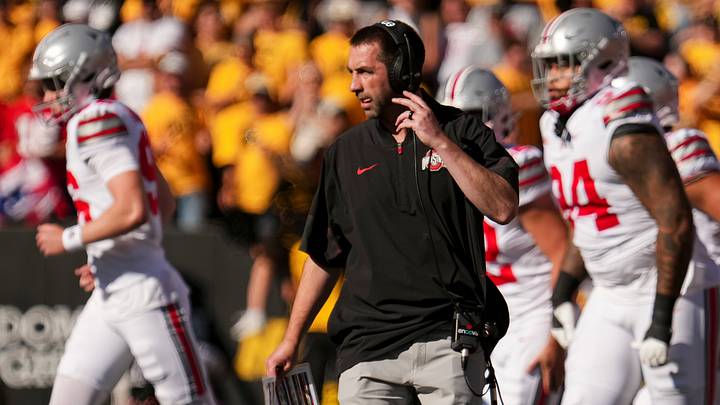 Ohio State Buckeyes special teams coordinator Robby Discher watches during the NCAA football game against the Iowa Hawkeyes at Kinnick Stadium in Iowa City on Oct. 3, 2026. Ohio State Buckeyes special teams coordinator Robby Discher watches during the NCAA football game against the Iowa Hawkeyes at Kinnick Stadium in Iowa City on Oct. 3, 2026.