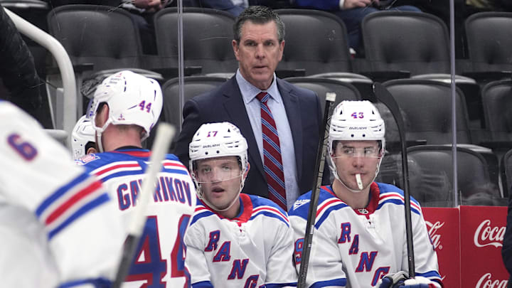 Mar 25, 2026; Toronto, Ontario, CAN; New York Rangers head coach Mike Sullivan (center) looks on from the bench during a break in the action against the Toronto Maple Leafs in the third period at Scotiabank Arena. Mandatory Credit: John E. Sokolowski-Imagn Images Mar 25, 2026; Toronto, Ontario, CAN; New York Rangers head coach Mike Sullivan (center) looks on from the bench during a break in the action against the Toronto Maple Leafs in the third period at Scotiabank Arena. Mandatory Credit: John E. Sokolowski-Imagn Images