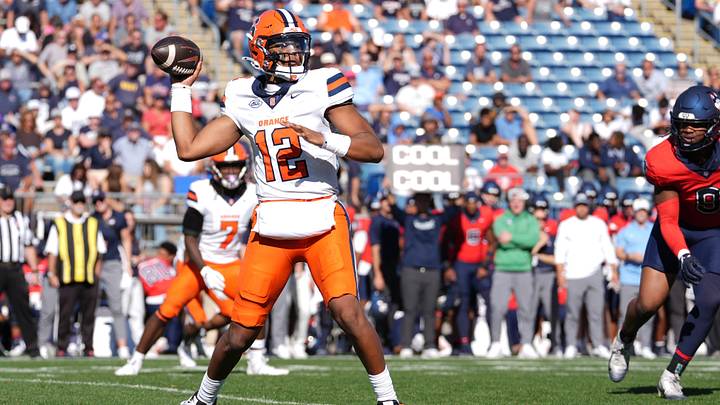 Oct 3, 2026; East Hartford, Connecticut, USA;  Syracuse Orange quarterback Amari Odom (12) throws the ball against the Connecticut Huskies during the second half at Pratt & Whitney Stadium at Rentschler Field.  Mandatory Credit: Gregory Fisher-Imagn Images
