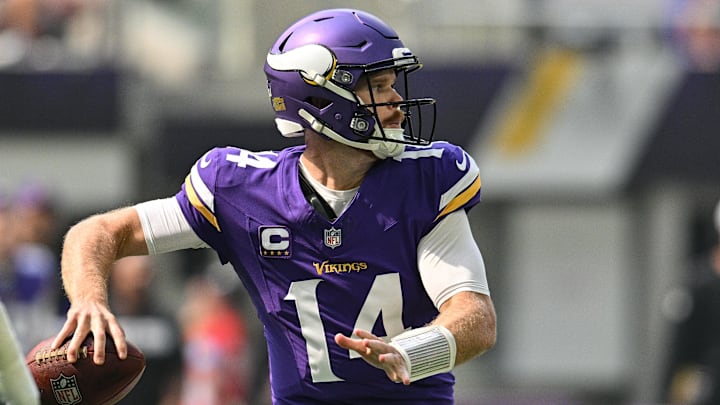 Sep 15, 2024; Minneapolis, Minnesota, USA; Minnesota Vikings quarterback Sam Darnold (14) in action against the San Francisco 49ers during the game at U.S. Bank Stadium. Mandatory Credit: Jeffrey Becker-Imagn Images