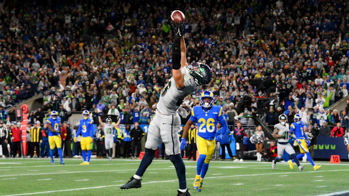 Dec 18, 2025; Seattle, Washington, USA; Seattle Seahawks tight end AJ Barner (88) makes a catch for a touchdown against the Los Angeles Rams in the second half at Lumen Field. Mandatory Credit: Steven Bisig-Imagn Images