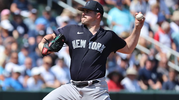 Mar 5, 2023; North Port, Florida, USA; New York Yankees starting pitcher Carlos Rodon (55) throws a