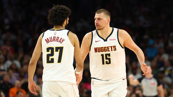 Mar 24, 2026; Phoenix, Arizona, USA; Denver Nuggets center Nikola Jokic (15) with guard Jamal Murray (27) against the Phoenix Suns in the second half at Mortgage Matchup Center. Mandatory Credit: Mark J. Rebilas-Imagn Images Mar 24, 2026; Phoenix, Arizona, USA; Denver Nuggets center Nikola Jokic (15) with guard Jamal Murray (27) against the Phoenix Suns in the second half at Mortgage Matchup Center. Mandatory Credit: Mark J. Rebilas-Imagn Images