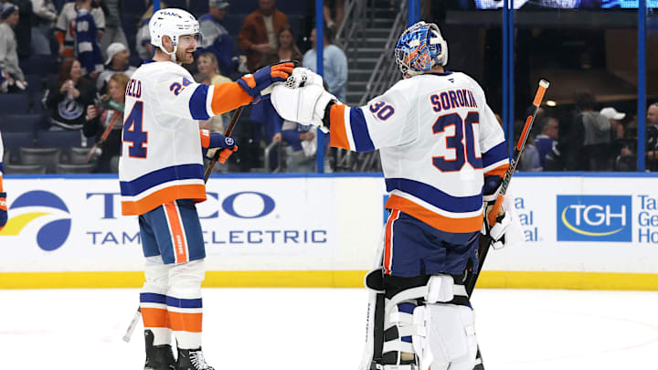 Dec 6, 2025; Tampa, Florida, USA;New York Islanders defenseman Scott Mayfield (24) and goaltender Ilya Sorokin (30) celebrate after they beat the Tampa Bay Lightning at Benchmark International Arena. Mandatory Credit: Kim Klement Neitzel-Imagn Images Dec 6, 2025; Tampa, Florida, USA;New York Islanders defenseman Scott Mayfield (24) and goaltender Ilya Sorokin (30) celebrate after they beat the Tampa Bay Lightning at Benchmark International Arena. Mandatory Credit: Kim Klement Neitzel-Imagn Images