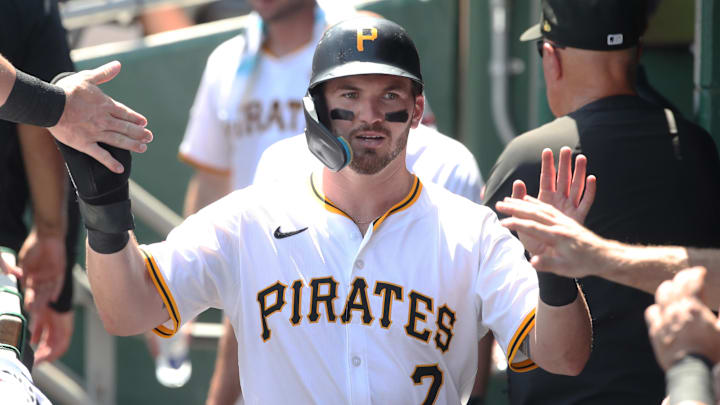 Jun 22, 2025; Pittsburgh, Pennsylvania, USA;  Pittsburgh Pirates first baseman Spencer Horwitz (2) high-fives in the dugout after scoring a run against the Texas Rangers during the fourth inning at PNC Park. Mandatory Credit: Charles LeClaire-Imagn Images