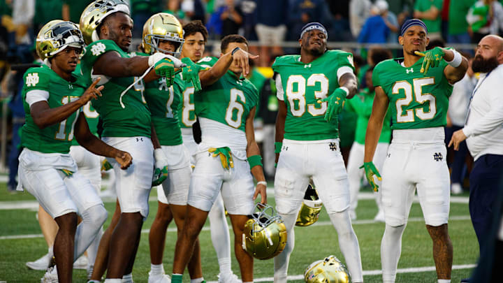 Notre Dame celebrates winning a NCAA college football game 31-24 against Louisville at Notre Dame Stadium on Saturday, Sept. 28, 2024, in South Bend.