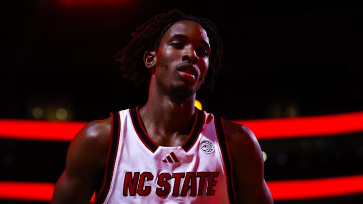 Dec 6, 2025; Raleigh, North Carolina, USA; NC State Wolfpack guard Jr. Paul McNeil (2) runs onto the court before the first half of the game against Liberty Flames at Lenovo Center. Mandatory Credit: Jaylynn Nash-Imagn Images