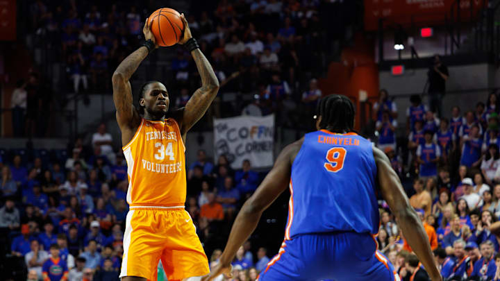 Jan 10, 2026; Gainesville, Florida, USA; Tennessee Volunteers center Felix Okpara (34) looks to pass while Florida Gators center Rueben Chinyelu (9) defends during the first half at Exactech Arena at the Stephen C. O'Connell Center. Mandatory Credit: Matt Pendleton-Imagn Images Jan 10, 2026; Gainesville, Florida, USA; Tennessee Volunteers center Felix Okpara (34) looks to pass while Florida Gators center Rueben Chinyelu (9) defends during the first half at Exactech Arena at the Stephen C. O'Connell Center. Mandatory Credit: Matt Pendleton-Imagn Images