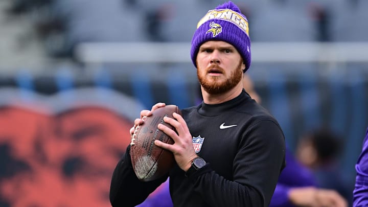 Nov 24, 2024; Chicago, Illinois, USA; Minnesota Vikings quarterback Sam Darnold (14) warms up before the game against the Chicago Bears at Soldier Field. Nov 24, 2024; Chicago, Illinois, USA; Minnesota Vikings quarterback Sam Darnold (14) warms up before the game against the Chicago Bears at Soldier Field.