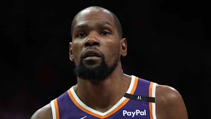 Mar 26, 2025; Phoenix, Arizona, USA; Phoenix Suns forward Kevin Durant (35) looks on against the Boston Celtics during the second half at Footprint Center. Mandatory Credit: Rick Scuteri-Imagn Images