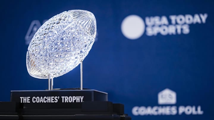 Jan 24, 2025; Columbus, OH, USA;  The AFCA Coaches' Trophy sits on display at the Ohio Union on Ohio State University's campus. The Buckeyes football team will be presented with the trophy on Sunday as winners of the USA TODAY Sports and the American Football Coaches Association 2024 US LBM Coaches Poll. Mandatory Credit: Adam Cairns-USA TODAY Network via Imagn Images