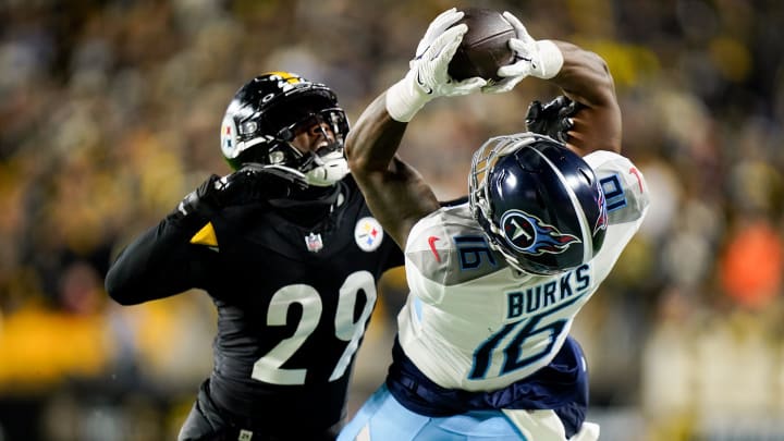 Tennessee Titans wide receiver Treylon Burks (16) leaps for the ball under Pittsburgh Steelers cornerback Levi Wallace (29) before falling hard on the field resulting in an injury during the fourth quarter in Pittsburgh, Pa., Thursday, Nov. 2, 2023.