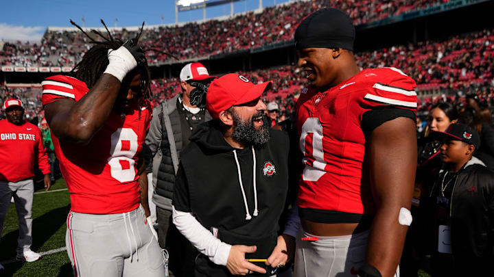 Ohio State Buckeyes defensive coordinator Matt Patricia celebrates with Ohio State Buckeyes linebacker Sonny Styles (0) and linebacker Arvell Reese (8) following the NCAA football game against the Penn State Nittany Lions at Ohio Stadium in Columbus on Nov. 1, 2025.
