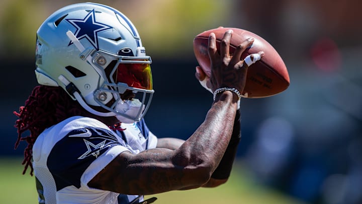 Dallas Cowboys wide receiver CeeDee Lamb makes a catch during training camp at Marriott Residence Inn-River Ridge playing fields. Dallas Cowboys wide receiver CeeDee Lamb makes a catch during training camp at Marriott Residence Inn-River Ridge playing fields.
