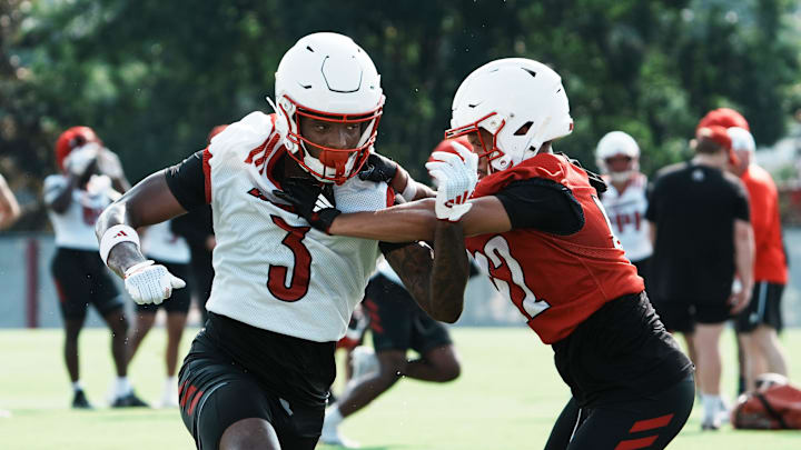 U of L WR Dacari Collins (3) fights to get open on a route on the practice field at Cardinal Stadium in Louisville, Ky. on July 30, 2025. U of L WR Dacari Collins (3) fights to get open on a route on the practice field at Cardinal Stadium in Louisville, Ky. on July 30, 2025.