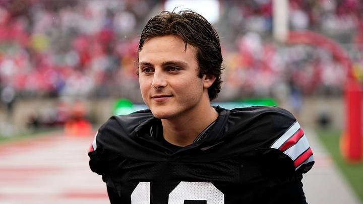 Quarterback Julian Sayin (10) walks across the field during the Ohio State football spring game at Ohio Stadium in Columbus on April 18, 2026.